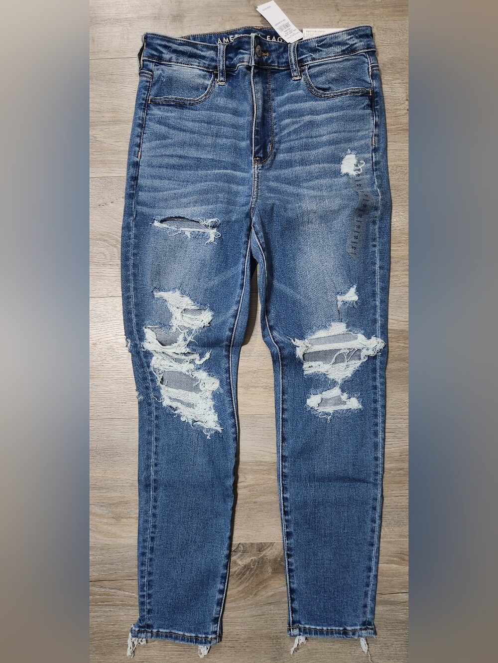 American Eagle Outfitters Distressed Skinny Jeans in Medium Blue Wash